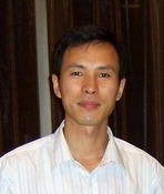 丁旵明 照片