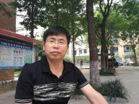 黄伟 照片