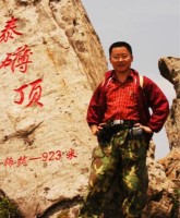 张荣京 照片