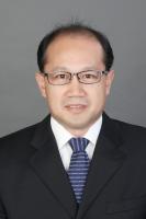 何玉成 照片