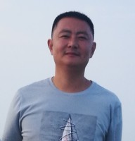 谭培育 照片