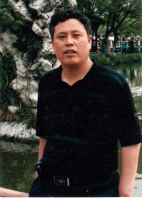 吴贵才 照片