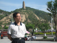 欧阳自根 照片