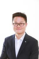 何学明 照片