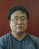 杨多明 照片