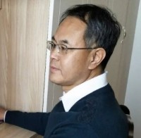 王国栓 照片