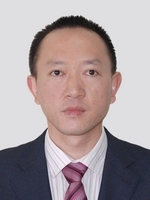 何明雄 照片