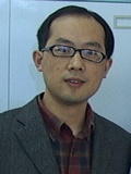 何强 照片