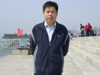 何明祥 照片