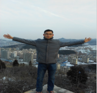 弭乐 照片