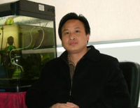 何文辉 照片
