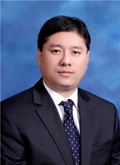 董明 照片