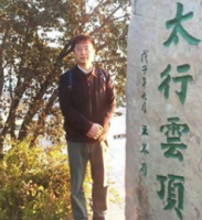 吴健荣 照片
