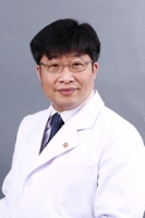 王梅生 照片