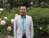 洪学仁 照片