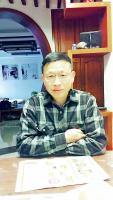 何谋惷 照片