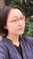 黄文克 照片