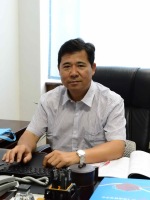 李明忠 照片