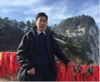 梁法春 照片