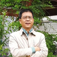 蔡辉 照片