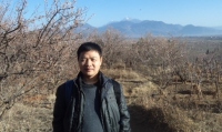 成忠 照片