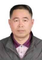 何交龙 照片
