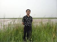 龙厚雄 照片