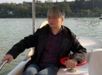 顾洪成 照片