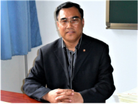 高国兴 照片