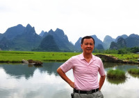 周建明 照片