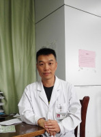 田君明 照片