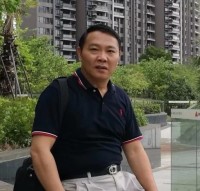 周平德 照片