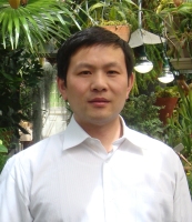 何光明 照片