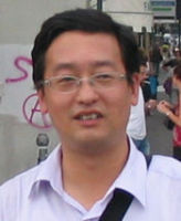 庞力平 照片