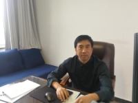 王震 照片